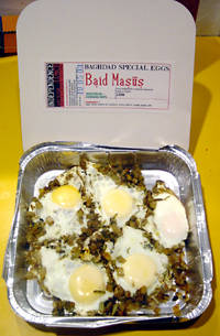 Baghdad Eggs in a takeaway container